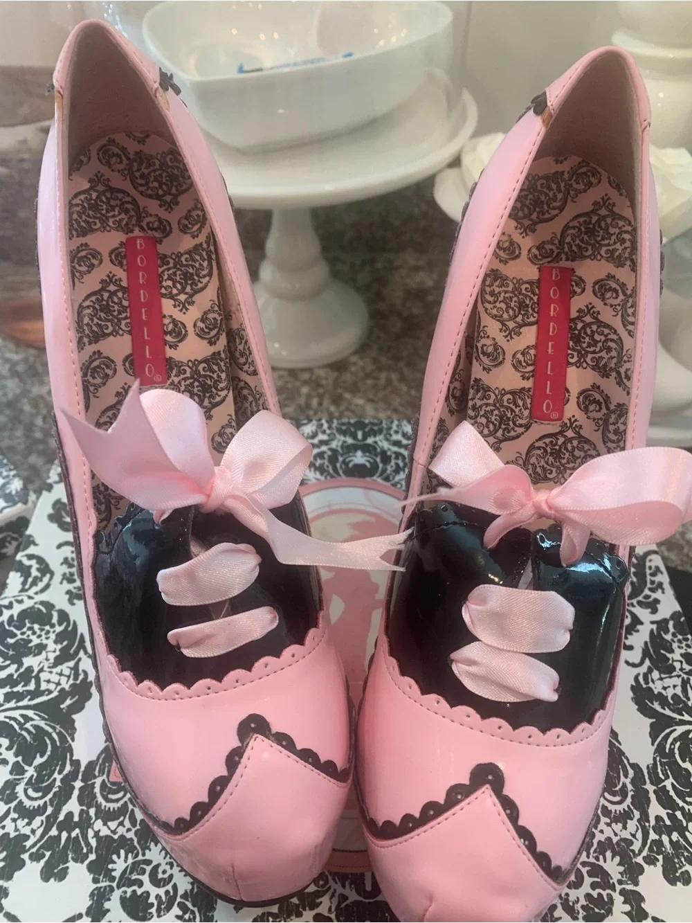 Bordello Pink Patent Platform Pumps with Black Trim and Ribbon